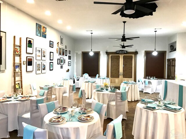 dining room featuring ceiling fan