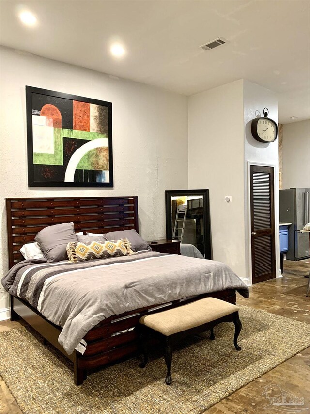 bedroom featuring hardwood / wood-style flooring