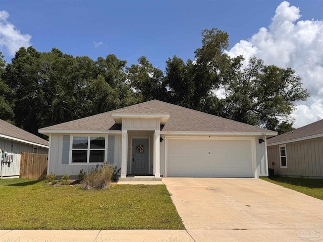 3468 Fallschase Blvd, Pensacola, FL 32526 - ranch-style home featuring driveway, a shingled roof, an attached garage, and board and batten siding