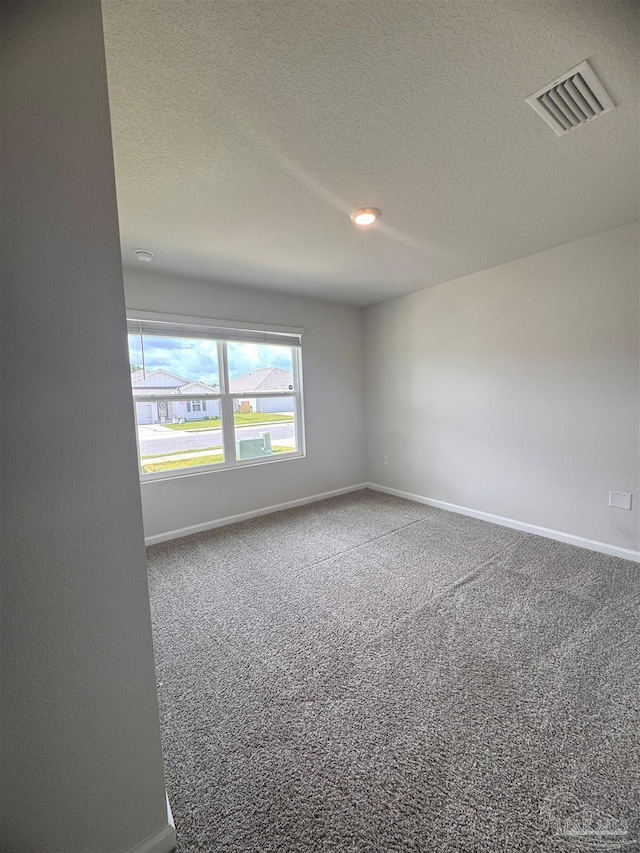 3468 Fallschase Blvd, Pensacola, FL 32526 - spare room with baseboards, carpet flooring, and a textured ceiling