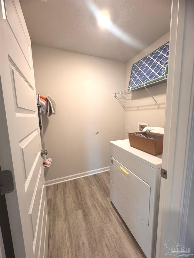 3468 Fallschase Blvd, Pensacola, FL 32526 - washroom with washer / clothes dryer, wood finished floors, baseboards, and a textured ceiling