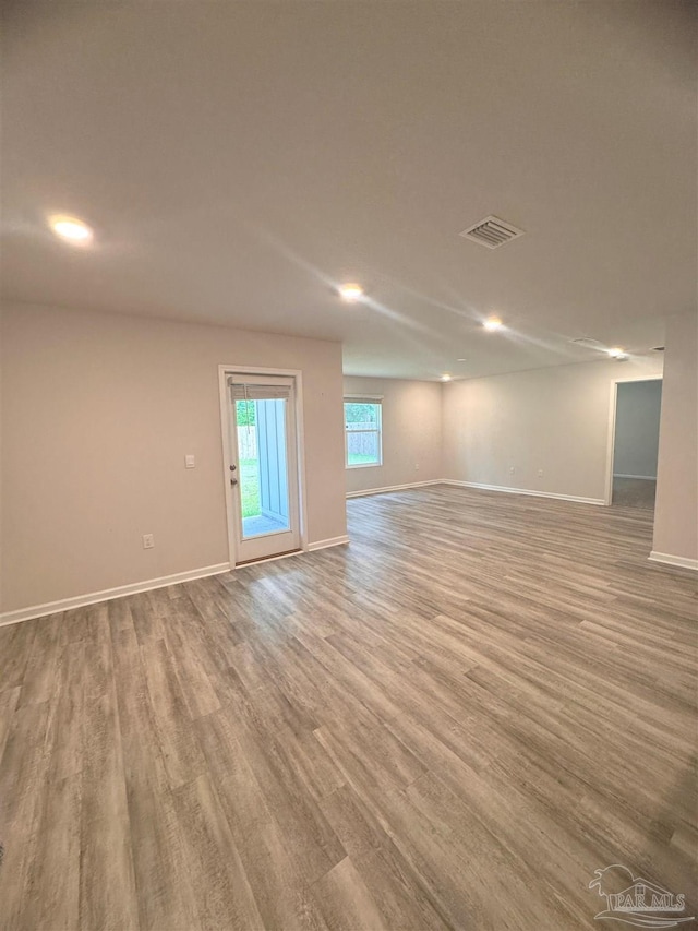 3468 Fallschase Blvd, Pensacola, FL 32526 - unfurnished room with baseboards, wood finished floors, and recessed lighting
