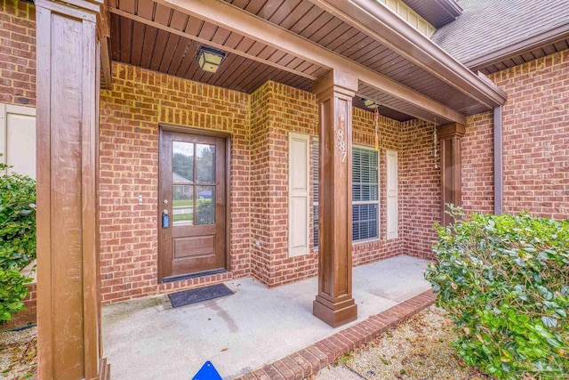 entrance to property with a porch