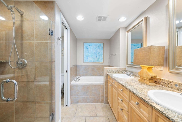 full bathroom with a stall shower, visible vents, and a sink