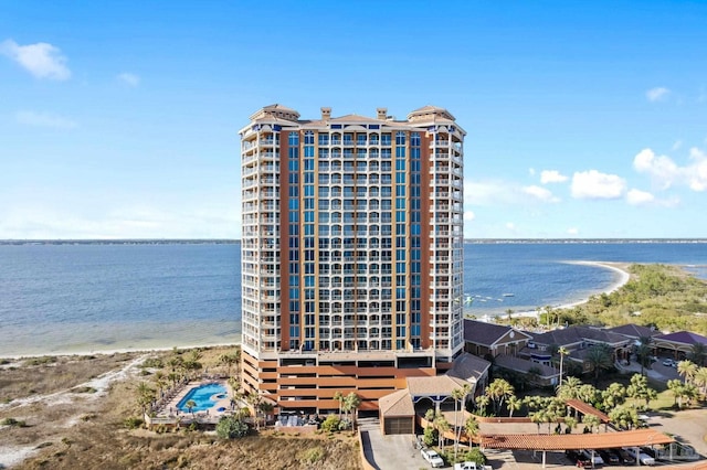view of building exterior with a water view