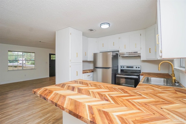 kitchen with a textured ceiling, sink, white cabinetry, and stainless steel appliances