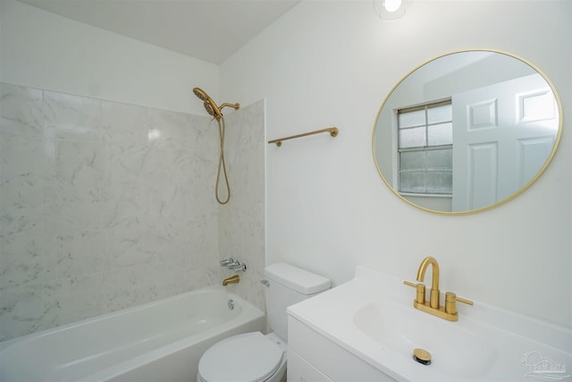 full bathroom featuring vanity, toilet, and tiled shower / bath