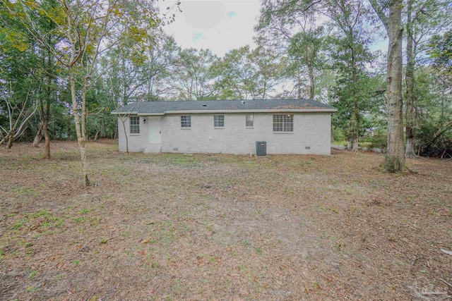 rear view of property with central air condition unit