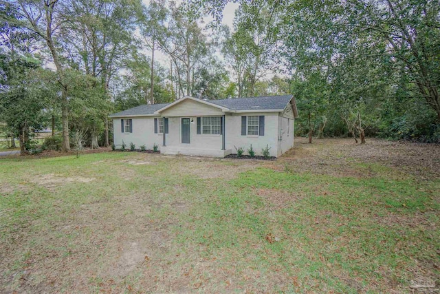 ranch-style house with a front yard