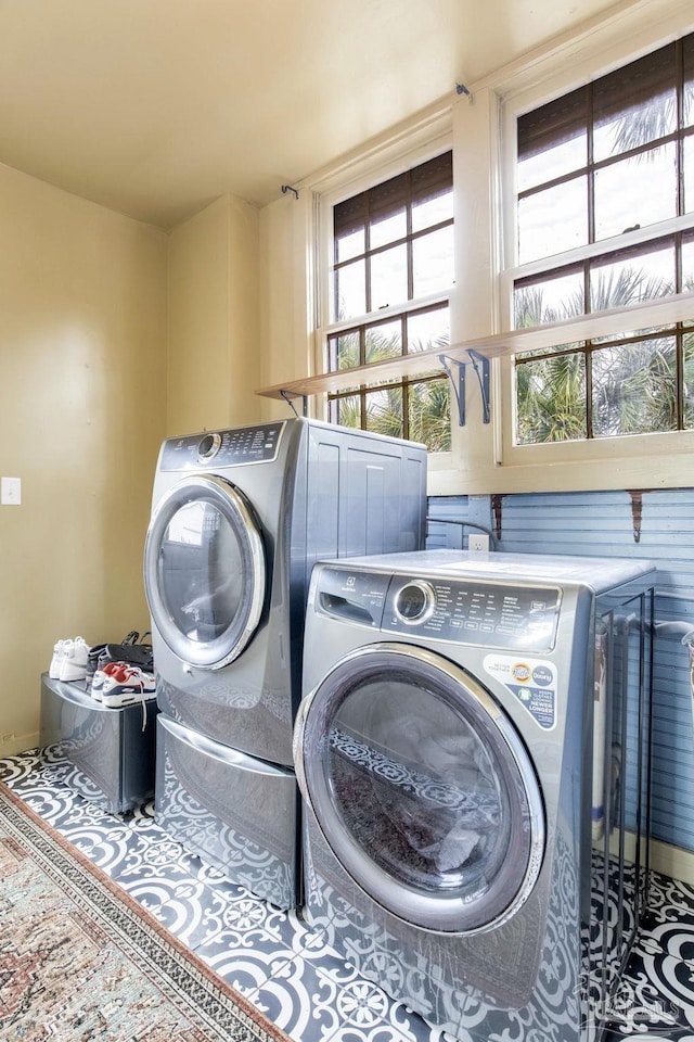 laundry area featuring laundry area and washer and dryer