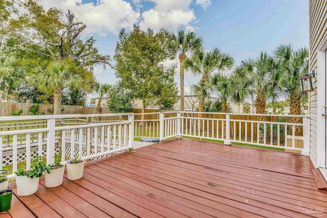 wooden deck featuring fence