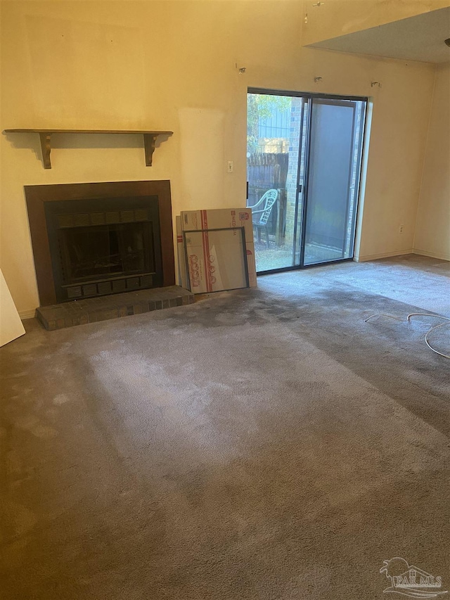 unfurnished living room with carpet