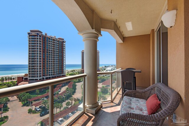 balcony featuring a water view