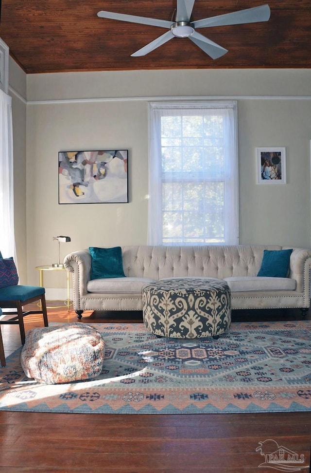 living room with lofted ceiling, wood finished floors, wood ceiling, and a ceiling fan