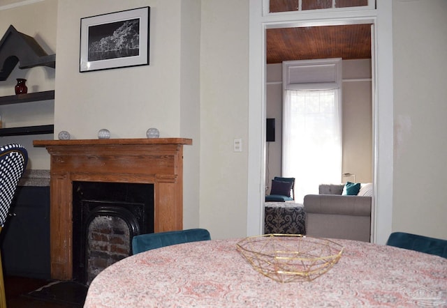 dining area featuring a fireplace