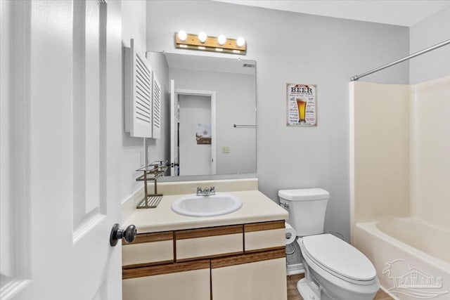 full bathroom featuring vanity, shower / bath combination, and toilet