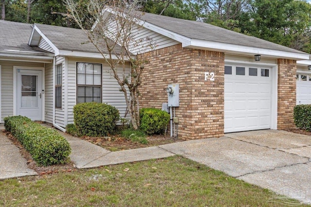 view of side of home featuring a garage