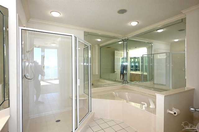 bathroom with vanity, a textured ceiling, crown molding, independent shower and bath, and tile patterned flooring