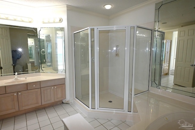 bathroom featuring a textured ceiling, tile patterned floors, a shower with shower door, and crown molding