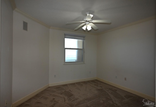 carpeted empty room with ceiling fan and ornamental molding