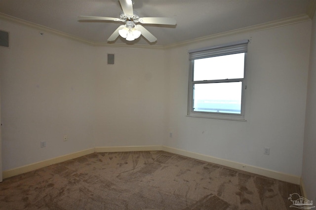 unfurnished room featuring carpet flooring, ceiling fan, and crown molding