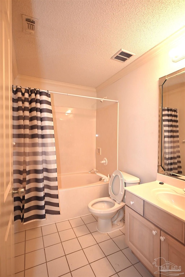 full bathroom with shower / bath combo, vanity, a textured ceiling, tile patterned flooring, and toilet