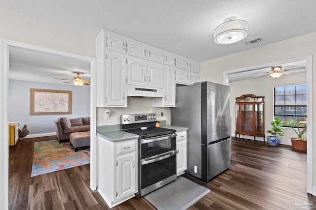 kitchen with white cabinetry, appliances with stainless steel finishes, and dark hardwood / wood-style flooring