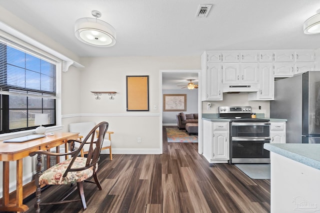 kitchen featuring appliances with stainless steel finishes, dark hardwood / wood-style floors, white cabinets, and ceiling fan