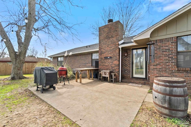 rear view of property with a patio area