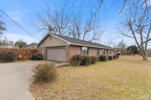 view of property exterior with a garage and a lawn