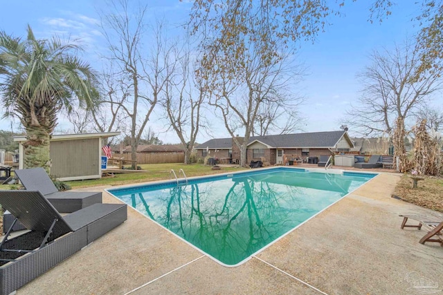 view of swimming pool featuring a patio