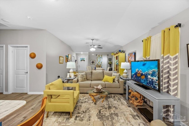138 Georgia St, Crestview, FL 32536 - living area featuring a ceiling fan, wood finished floors, and baseboards