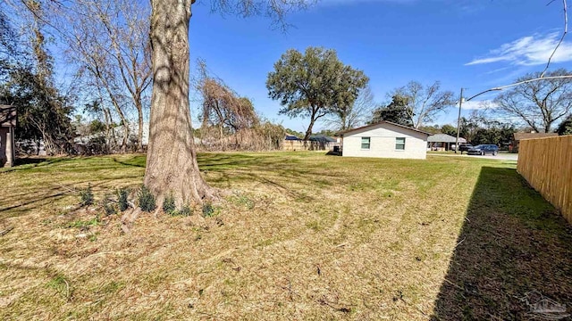 view of yard featuring fence