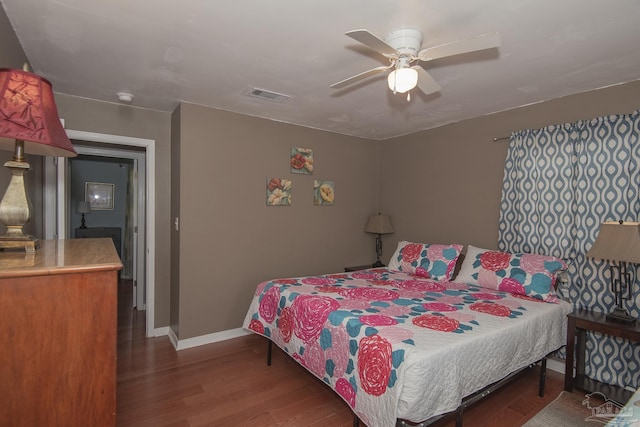 bedroom with hardwood / wood-style flooring and ceiling fan