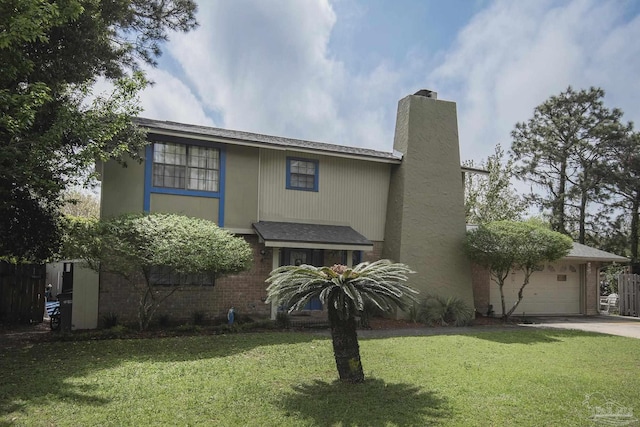 view of front of house with a garage and a front yard