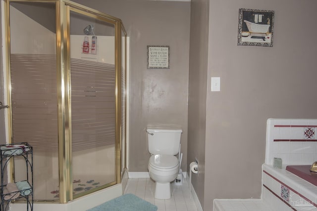 bathroom with toilet, tile patterned floors, and shower with separate bathtub