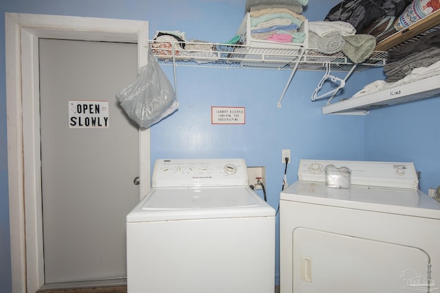 washroom with washer and clothes dryer