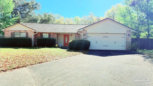 single story home with roof with shingles, fence, an attached garage, driveway, and brick siding