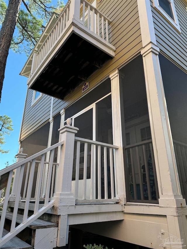 view of home's exterior featuring a balcony