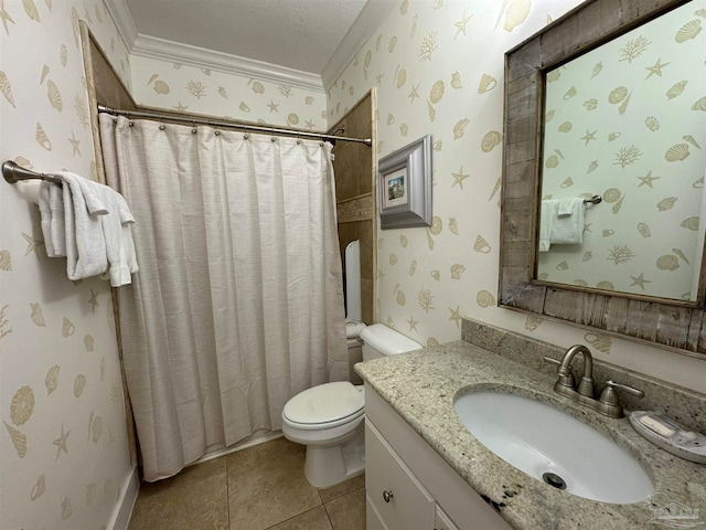 bathroom with vanity, tile patterned floors, toilet, ornamental molding, and a textured ceiling