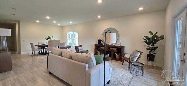 5023 Vanerka Dr, Gulf Breeze, FL 32563 - living room with plenty of natural light, recessed lighting, light wood-style flooring, and baseboards