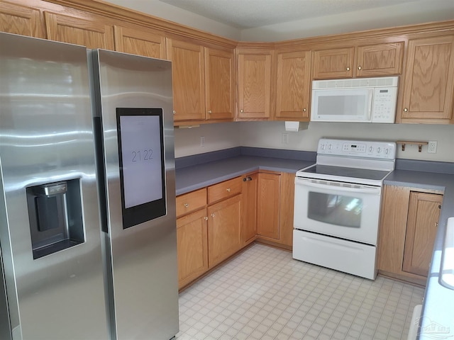 kitchen featuring white appliances