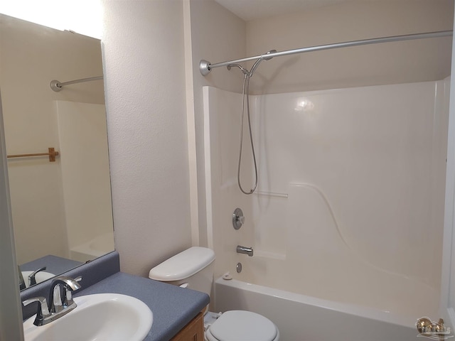 full bathroom featuring vanity, shower / bathtub combination, and toilet