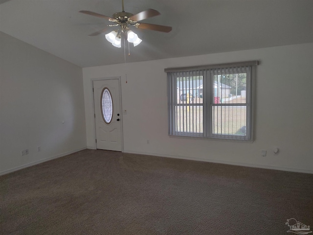 carpeted entrance foyer with ceiling fan