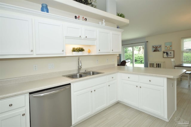 5735 Farrel Way, Milton, FL 32583 - kitchen featuring dishwasher, a sink, a peninsula, and plenty of natural light