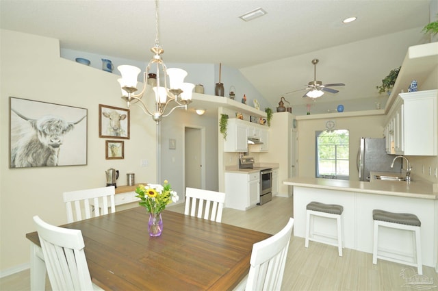 5735 Farrel Way, Milton, FL 32583 - dining room featuring a chandelier, vaulted ceiling, ceiling fan, and recessed lighting
