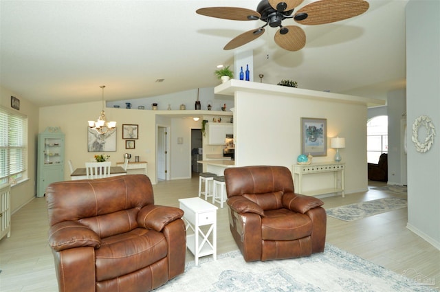 5735 Farrel Way, Milton, FL 32583 - living room featuring a chandelier, lofted ceiling, healthy amount of natural light, ceiling fan, and light wood finished floors