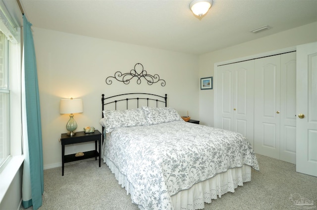 5735 Farrel Way, Milton, FL 32583 - bedroom with carpet floors, a closet, and baseboards