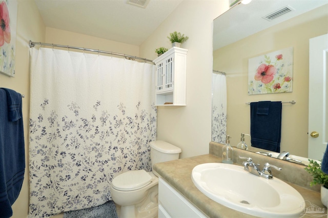 5735 Farrel Way, Milton, FL 32583 - full bath featuring toilet, vanity, and a shower with shower curtain