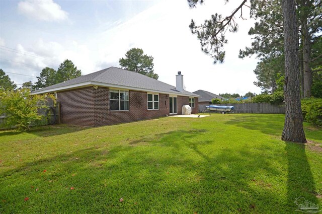 5735 Farrel Way, Milton, FL 32583 - view of yard with a patio